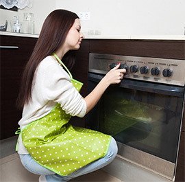 Adjusting the temperature of an oven